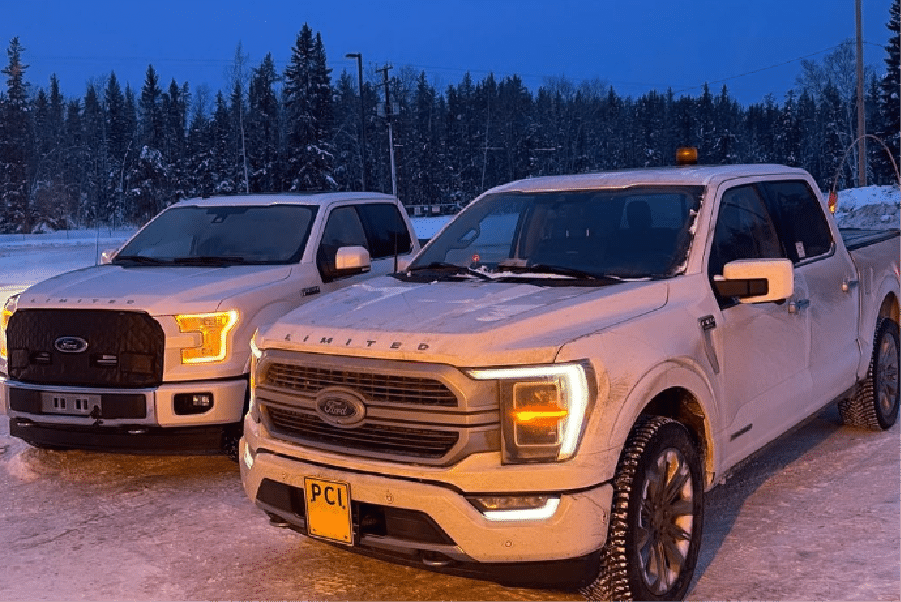 pci surveys trucks on a construction surveying job in the northwest territories